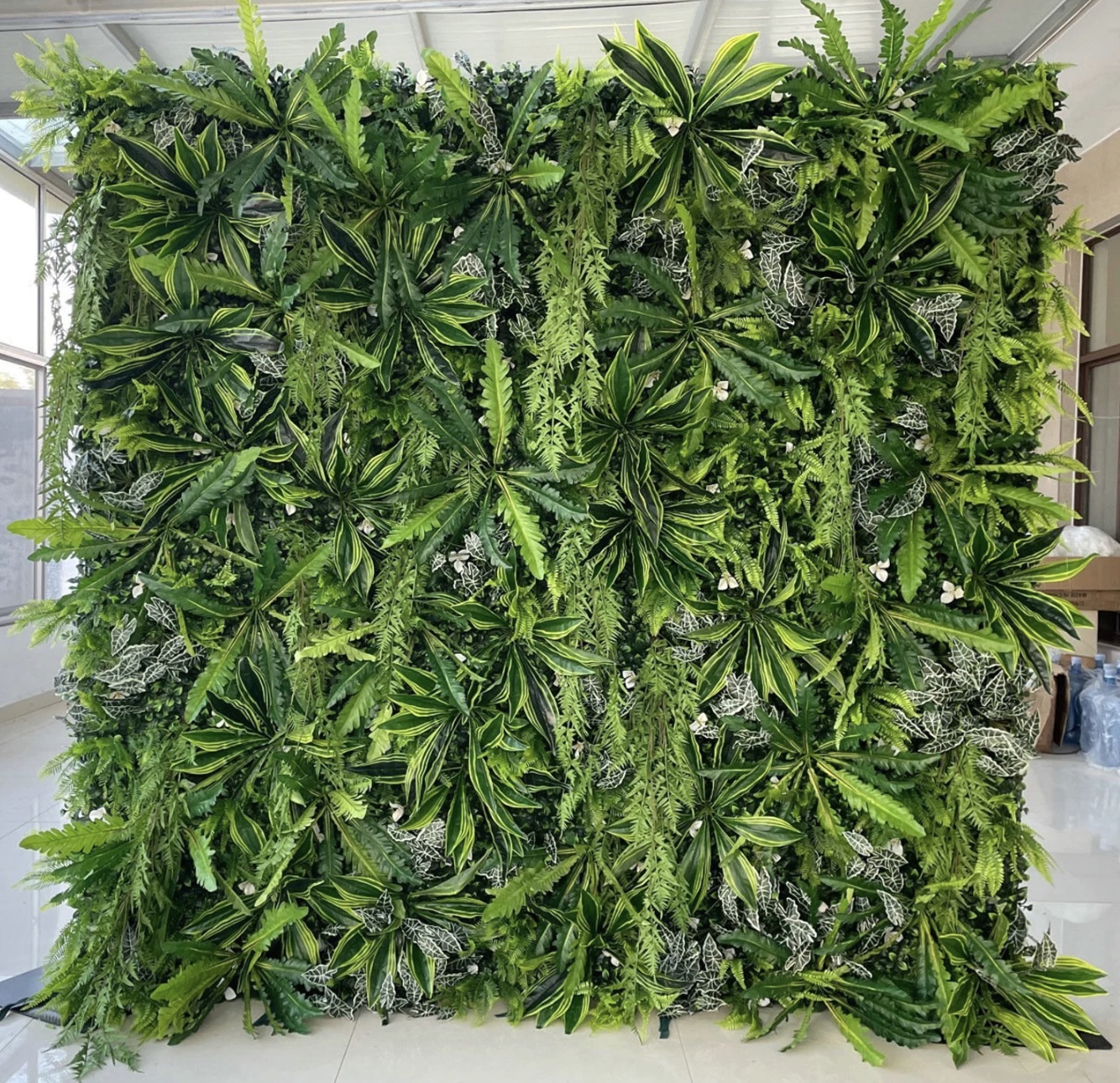 Wild Bloom tropical greenery flower wall rental for Nashville birthdays and corporate events.